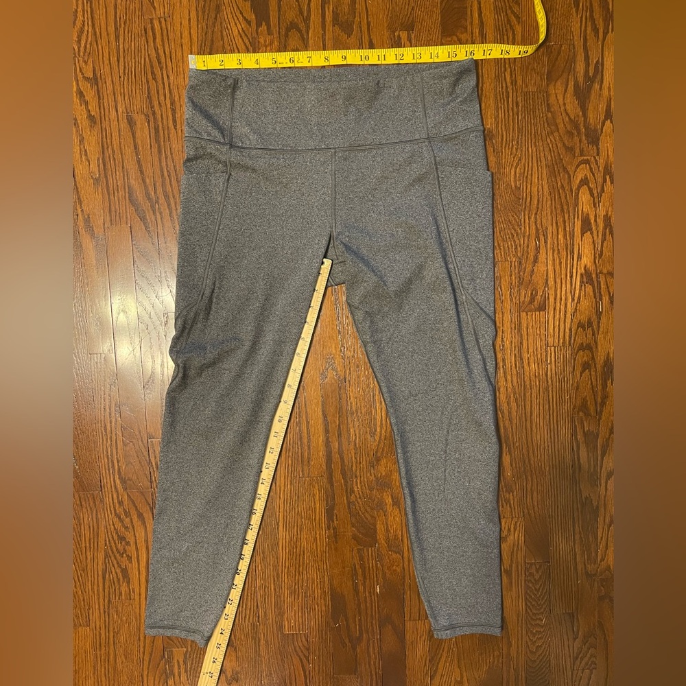 Athleta Stash Pocket Salutation Tight.  Size XL.